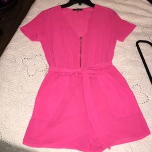 Neon Pink front-zip romper with pockets